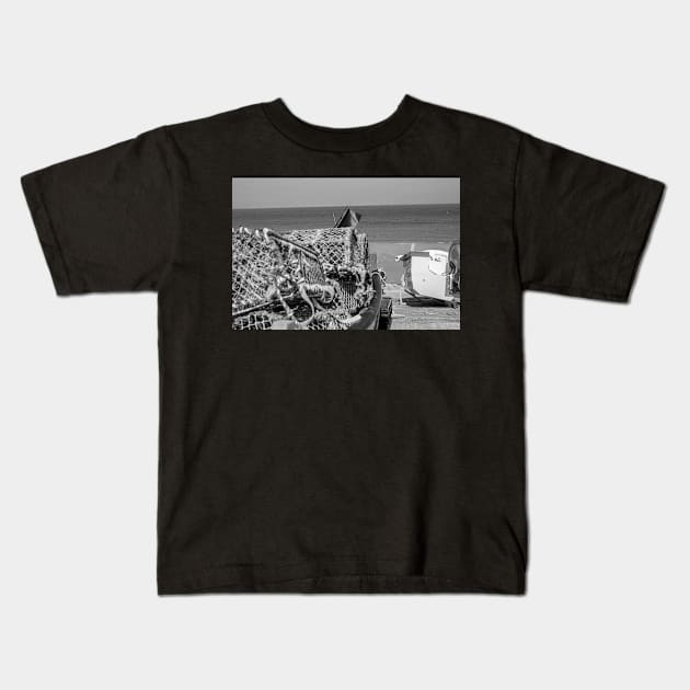 Lobster and crab pots on a fishing boat on the Norfolk coast Kids T-Shirt by yackers1
